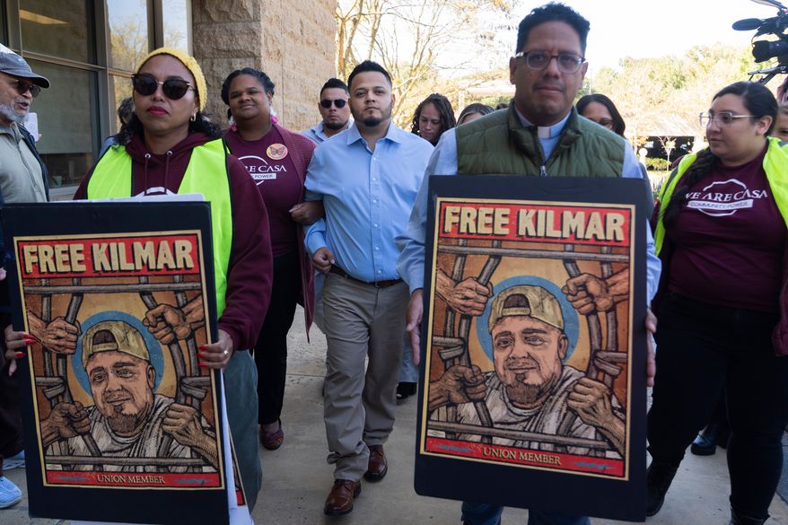 Kilmar Abrego Garcia, center, arrives with his supporters at the U.S. District Court for the District of Maryland, in Greenbelt, Md., for a hearing in the immigration-related case of Kilmar Abrego Garcia, Tuesday, Oct. 6, 2026. (AP Photo/Manuel Balce Ceneta)