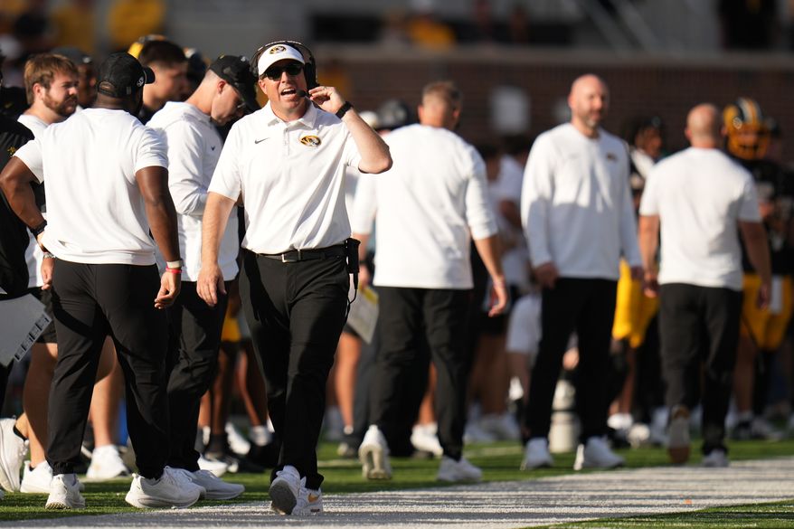 Missouri head coach Eli Drinkwitz watches from the sidelines during the second half of an NCAA college football game against Florida Saturday, Oct. 3, 2026, in Columbia, Mo. (AP Photo/Jeff Roberson)