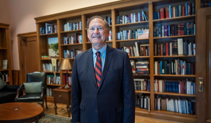 Associate Justice Samuel Alito stands in his chambers at the Supreme Court during an Associated Press interview, in Washington, Tuesday, Sept. 29, 2026. (AP Photo/J. Scott Applewhite)