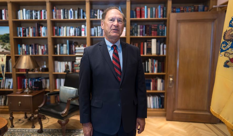 Associate Justice Samuel Alito stands in his chambers at the Supreme Court during an Associated Press interview, in Washington, Tuesday, Sept. 29, 2026. (AP Photo/J. Scott Applewhite)