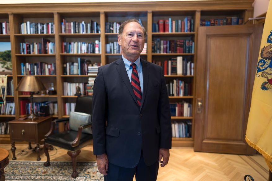 Associate Justice Samuel Alito stands in his chambers at the Supreme Court during an Associated Press interview, in Washington, Tuesday, Sept. 29, 2026. (AP Photo/J. Scott Applewhite)