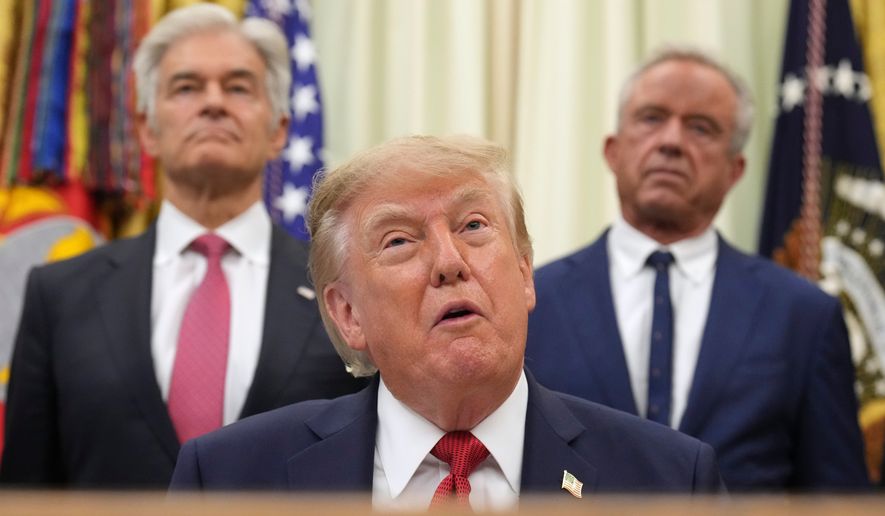 President Donald Trump speaks as Mehmet Oz, administrator of the Centers for Medicare & Medicaid Services, left, and Health and Human Services Secretary Robert F. Kennedy Jr. listen during an event about healthcare, in the Oval Office of the White House, Friday Sept. 18, 2026, in Washington. (AP Photo/Jacquelyn Martin)