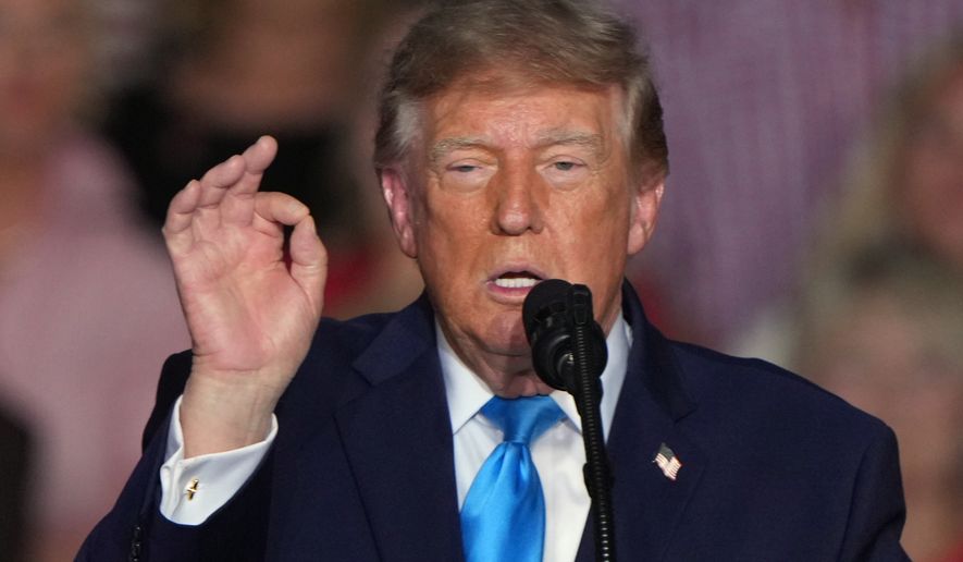 President Donald Trump speaks at a campaign rally at the Pinnacle Bank Expo Center, Monday, Oct. 5, 2026, in Grand Island, Neb. (AP Photo/Charlie Riedel)