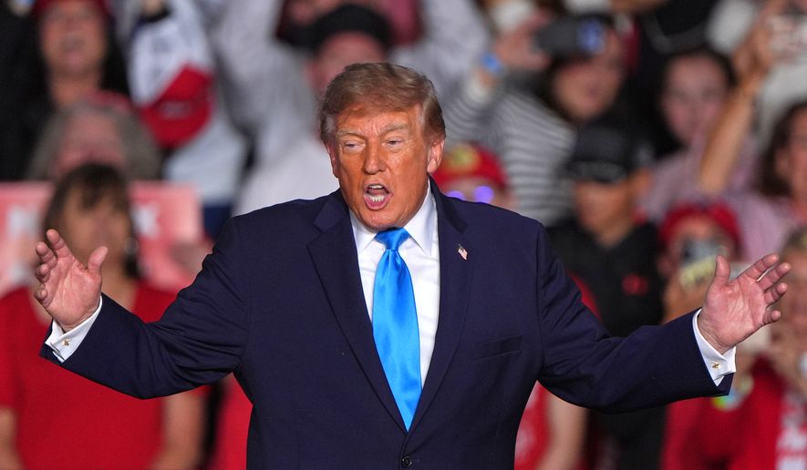 President Donald Trump arrives at a campaign rally at the Pinnacle Bank Expo Center, Monday, Oct. 5, 2026, in Grand Island, Neb. (AP Photo/Charlie Riedel)