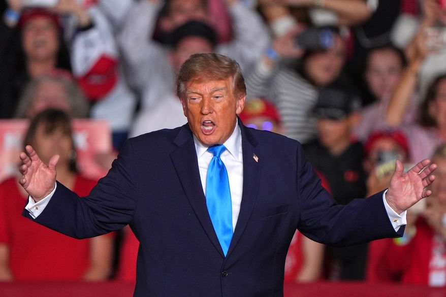 President Donald Trump arrives at a campaign rally at the Pinnacle Bank Expo Center, Monday, Oct. 5, 2026, in Grand Island, Neb. (AP Photo/Charlie Riedel)