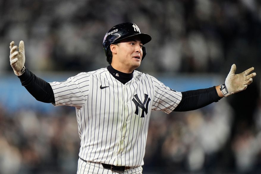 New York Yankees' Anthony Volpe celebrates his run-scoring double during the sixth inning in Game 3 of baseball's American League Division Series against the Tampa Bay Rays, Wednesday, Oct. 7, 2026, in New York. (AP Photo/Seth Wenig)