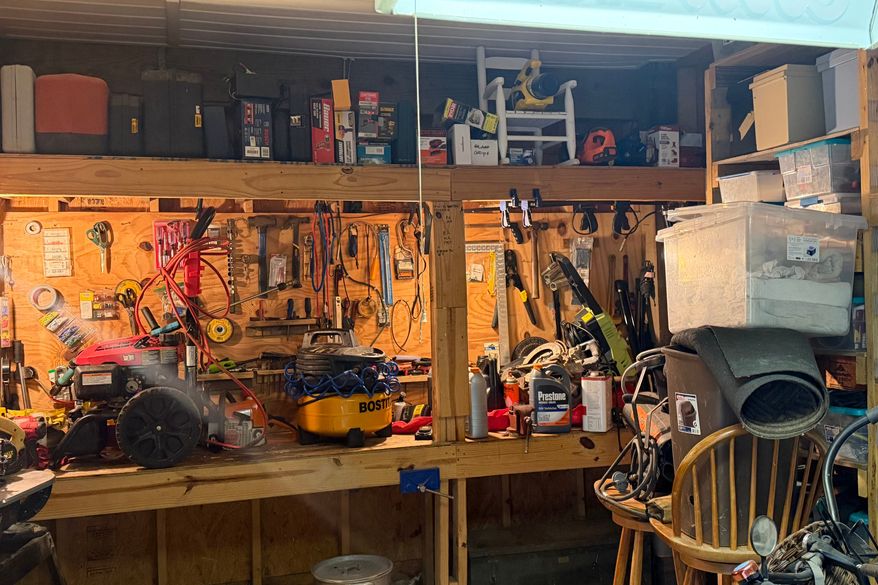 This photo taken with a smartphone and provided by Maranie Adams shows various belongings being stored on higher shelves ahead of the arrival of Tropical Storm Isaias on Wednesday, Oct. 7, 2026, in Gulf Shores, Ala. (Maranie Adams via AP)