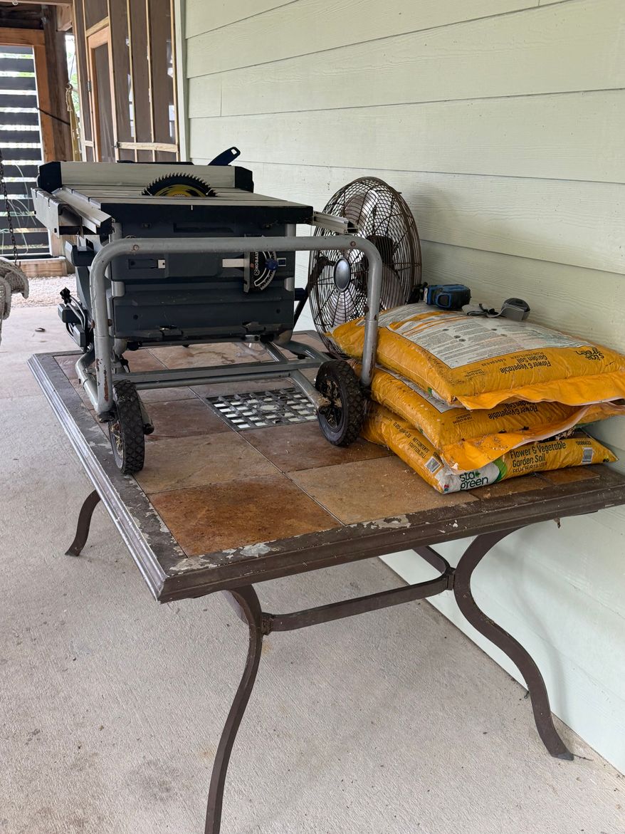 This photo taken with a smartphone and provided by Maranie Adams shows various belongings stored on higher surfaces ahead of the arrival of Tropical Storm Isaias on Wednesday, Oct. 7, 2026, in Gulf Shores, Ala. (Maranie Adams via AP)