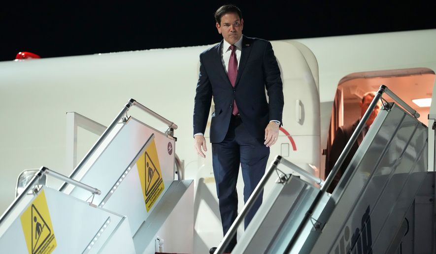 U.S. Secretary of State Marco Rubio steps off a plane at Athens' Eleftherios Venizelos international airport, near Athens , Greece, on Tuesday, Oct. 6, 2026.(AP Photo/Mark Schiefelbein, Pool)