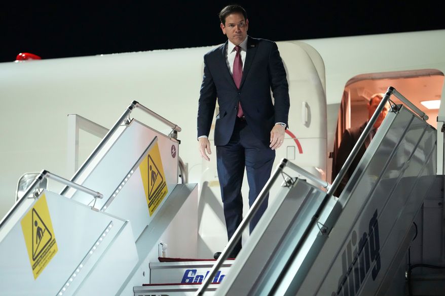 U.S. Secretary of State Marco Rubio steps off a plane at Athens' Eleftherios Venizelos international airport, near Athens , Greece, on Tuesday, Oct. 6, 2026.(AP Photo/Mark Schiefelbein, Pool)