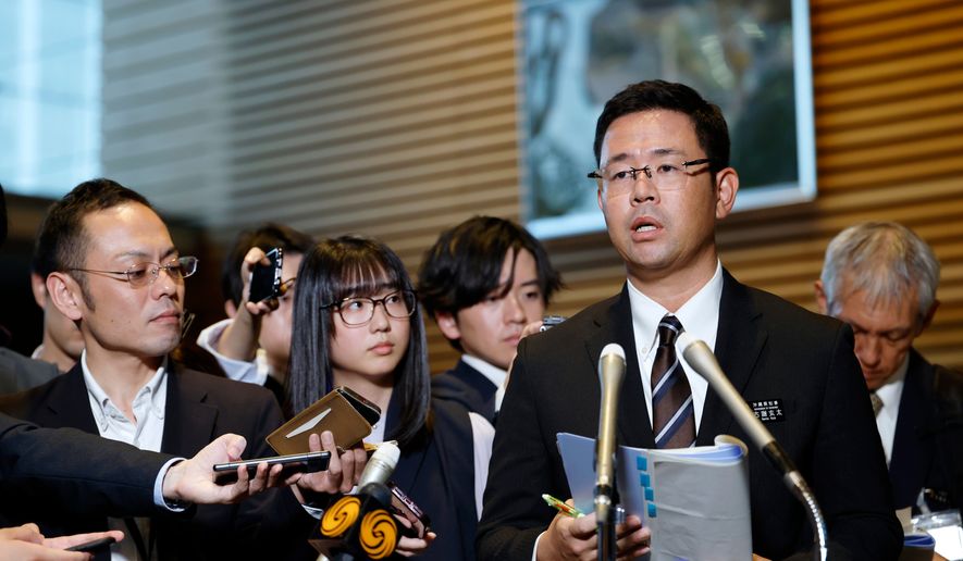 Okinawa Gov. Genta Koja speaks to reporters after his meeting with Japanese Prime Minister Sanae Takaichi at the prime minister's office in Tokyo, Japan, Wednesday, Oct.7, 2026. (Franck Robichon/Pool Photo via AP)