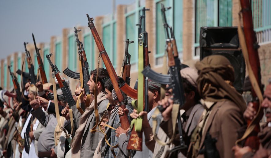 Houthi supporters carry their rifles while attending an armed tribal rally in Sanaa, Yemen, Wednesday, Oct. 7, 2026. (AP Photo/Osamah Abdulrahman)