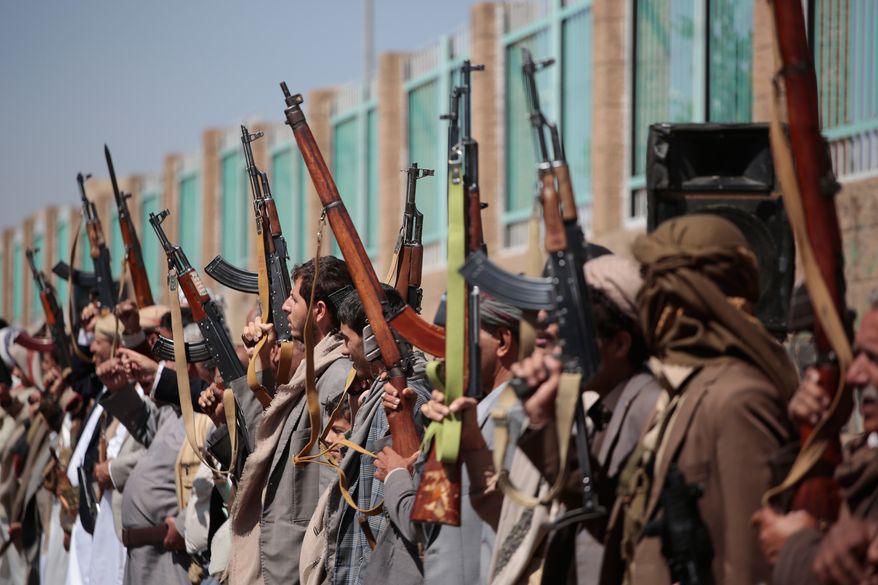Houthi supporters carry their rifles while attending an armed tribal rally in Sanaa, Yemen, Wednesday, Oct. 7, 2026. (AP Photo/Osamah Abdulrahman)
