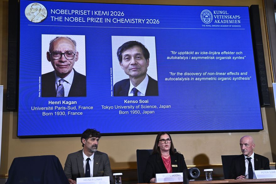 Portraits of Henri Kagan and Kenso Soai are shown on the screen as they are awarded the 2026 Nobel Prize in Chemistry, at the Royal Swedish Academy of Sciences in Stockholm, Sweden, on Oct. 7, 2026. Photo: (Fredrik Sandberg/TT News Agency via AP)
