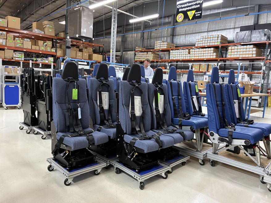 Crashworthy seats for U.S. military helicopters sit on the floor of the Martin-Baker America facility in Johnstown, Pennsylvania. (The Washington Times)