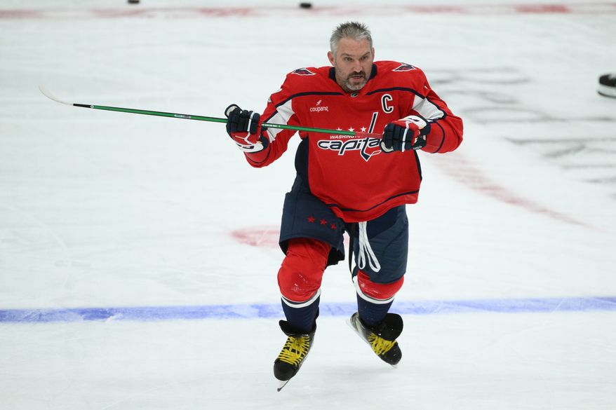 Washington Capitals left wing Alex Ovechkin (8) warms up before an NHL hockey game against the Pittsburgh Penguins, Wednesday, Oct. 7, 2026, in Washington. (AP Photo/Nick Wass)