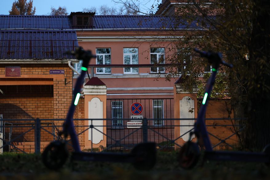 Electric scooters are parked next to the building of the Irkutsk Anti-Plague Research Institute of Siberia and the Far East in Irkutsk, Russi, on Wednesday, Oct. 7, 2026. (AP Photo)