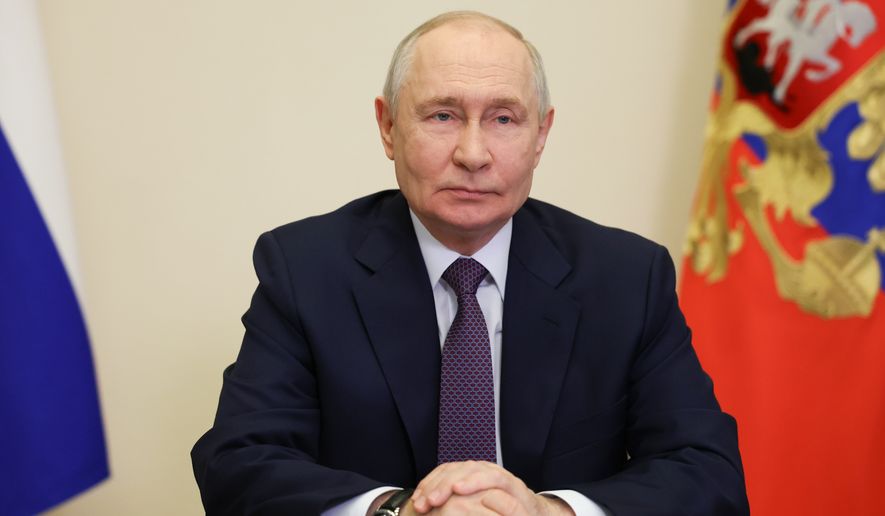 Russian President Vladimir Putin attends a meeting on the development of energy storage systems via videoconference, at the Novo-Ogaryovo state residence, outside Moscow, Russia, Tuesday, Oct. 6, 2026. (Vyacheslav Prokofyev/Sputnik, Kremlin Pool Photo via AP)