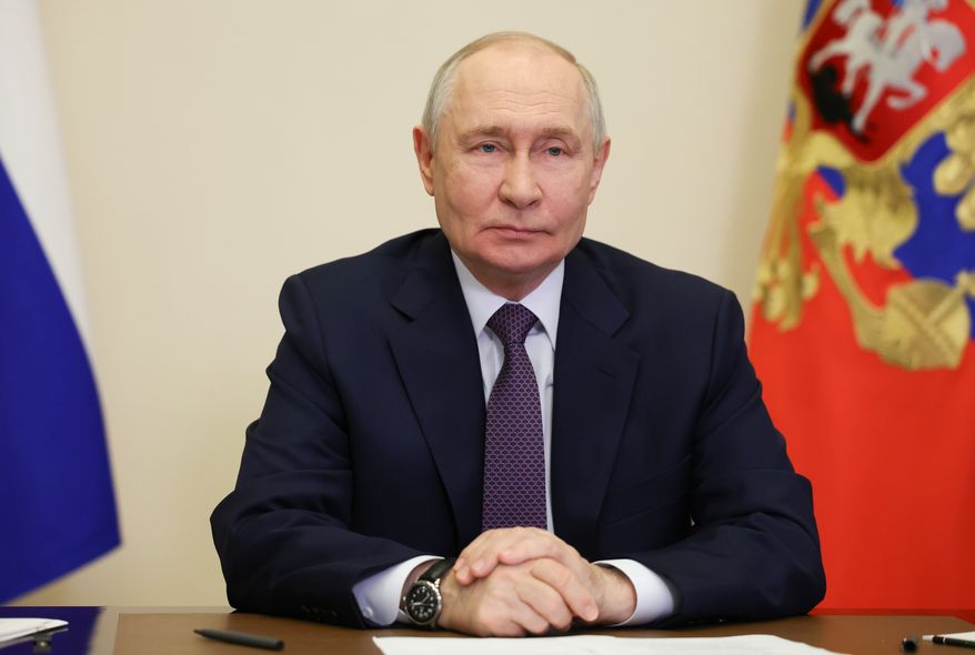 Russian President Vladimir Putin attends a meeting on the development of energy storage systems via videoconference, at the Novo-Ogaryovo state residence, outside Moscow, Russia, Tuesday, Oct. 6, 2026. (Vyacheslav Prokofyev/Sputnik, Kremlin Pool Photo via AP)