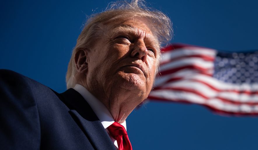President Donald Trump speaks with reporters before boarding Marine One on the South Lawn of the White House, Wednesday, Oct. 7, 2026, in Washington. (AP Photo/Julia Demaree Nikhinson)