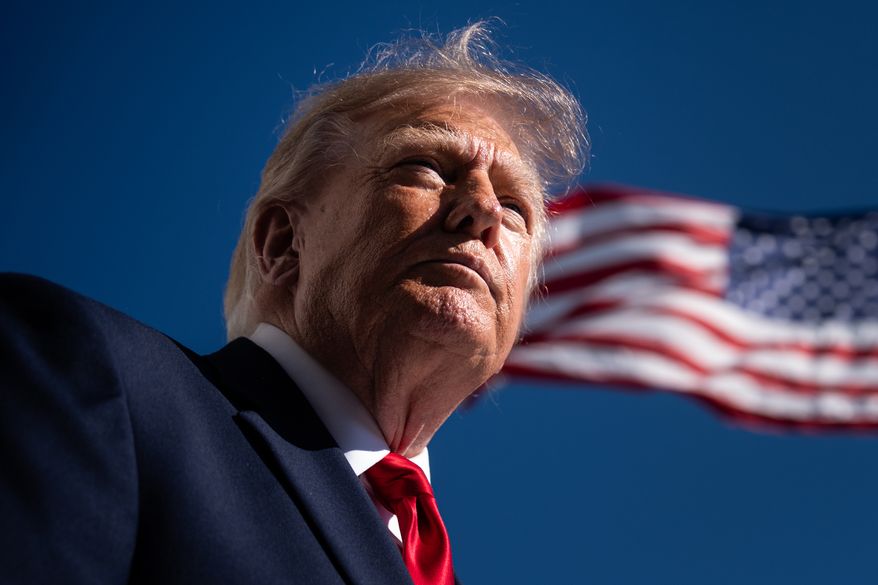 President Donald Trump speaks with reporters before boarding Marine One on the South Lawn of the White House, Wednesday, Oct. 7, 2026, in Washington. (AP Photo/Julia Demaree Nikhinson)