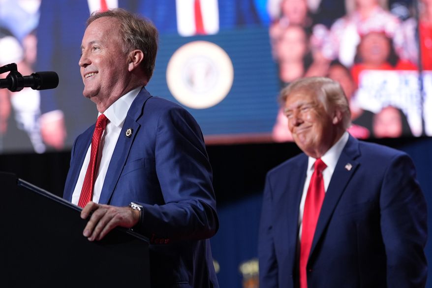President Donald Trump listens as Republican U.S. Senate candidate Texas Attorney General Ken Paxton speaks at a campaign rally at the Freeman Coliseum in San Antonio, Wednesday, Oct. 7, 2026. (AP Photo/Alex Brandon)