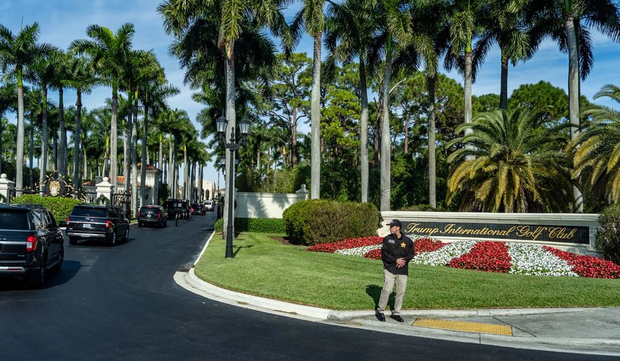 The motorcade for President Donald Trump arrives at Trump International Golf Club, Jan. 2, 2026, in West Palm Beach, Fla. (AP Photo/Alex Brandon, File)