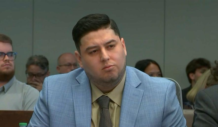 In this frame grab from video, Miguel Salguero-Olivares, who is on trial for the murder and rape of University of North Carolina student Faith Hedgepeth, listens to the prosecution's opening argument at a courthouse in Durham, N.C., on Wednesday, Oct. 7, 2026. (Network Pool/via AP)