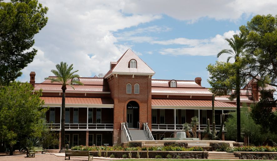 The original Old Main building on the University of Arizona campus is seen Friday, July 31, 2015, in Tucson, Ariz. (AP Photo/Ross D. Franklin)