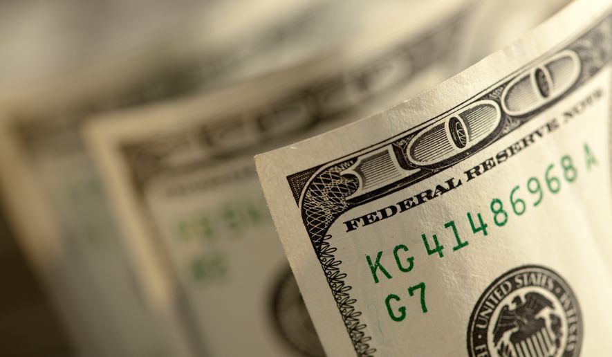 One-hundred-dollar bills. File photo credit: Andy Dean Photography via Shutterstock.