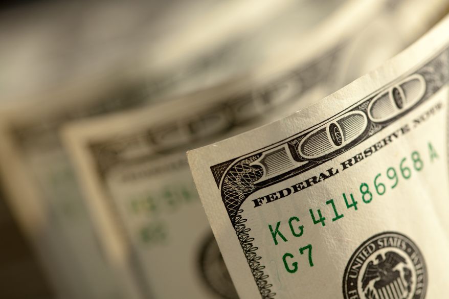 One-hundred-dollar bills. File photo credit: Andy Dean Photography via Shutterstock.