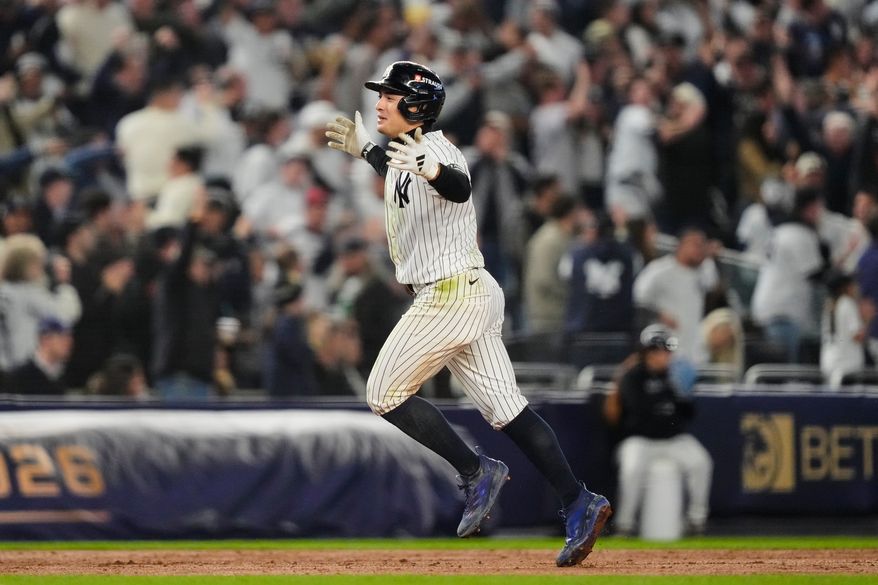 New York Yankees' Anthony Volpe celebrates his run-scoring double during the sixth nning in Game 3 of baseball's American League Division Series against the Tampa Bay Rays, Wednesday, Oct. 7, 2026, in New York. (AP Photo/Yuki Iwamura)
