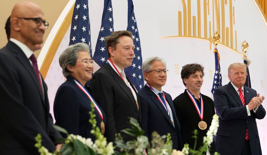 President Donald Trump, from right, poses with National Medal of Science recipients Google co-Founder Sergey Brin, Nvidia CEO Jensen Huang, Elon Musk, Lisa Su, CEO of Advanced Micro Devices, and National Media of Technology and Innovation recipients Dell CEO Michael Dell, obstructed, and Microsoft CEO Satya Nadella during an event at the U.S. Institute of Peace, Thursday, Oct. 8, 2026, in Washington. (AP Photo/Julia Demaree Nikhinson)