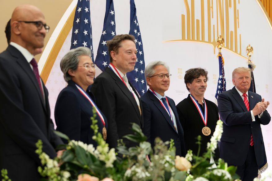 President Donald Trump, from right, poses with National Medal of Science recipients Google co-Founder Sergey Brin, Nvidia CEO Jensen Huang, Elon Musk, Lisa Su, CEO of Advanced Micro Devices, and National Media of Technology and Innovation recipients Dell CEO Michael Dell, obstructed, and Microsoft CEO Satya Nadella during an event at the U.S. Institute of Peace, Thursday, Oct. 8, 2026, in Washington. (AP Photo/Julia Demaree Nikhinson)