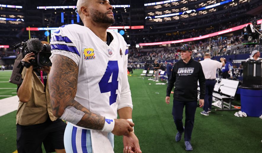 Dallas Cowboys quarterback Dak Prescott (4) leaves the field after a loss to the Tampa Bay Buccaneers in an NFL football game in Arlington, Texas on Thursday, Oct. 8, 2026. (AP Photo/Sam Hodde)