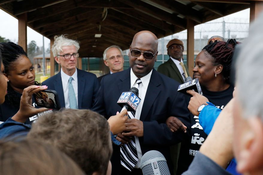 FILE - Curtis Flowers speaks with reporters as he exits the Winston-Choctaw Regional Correctional Facility in Louisville, Miss., Monday, Dec. 16, 2019. (AP Photo/Rogelio V. Solis, File)