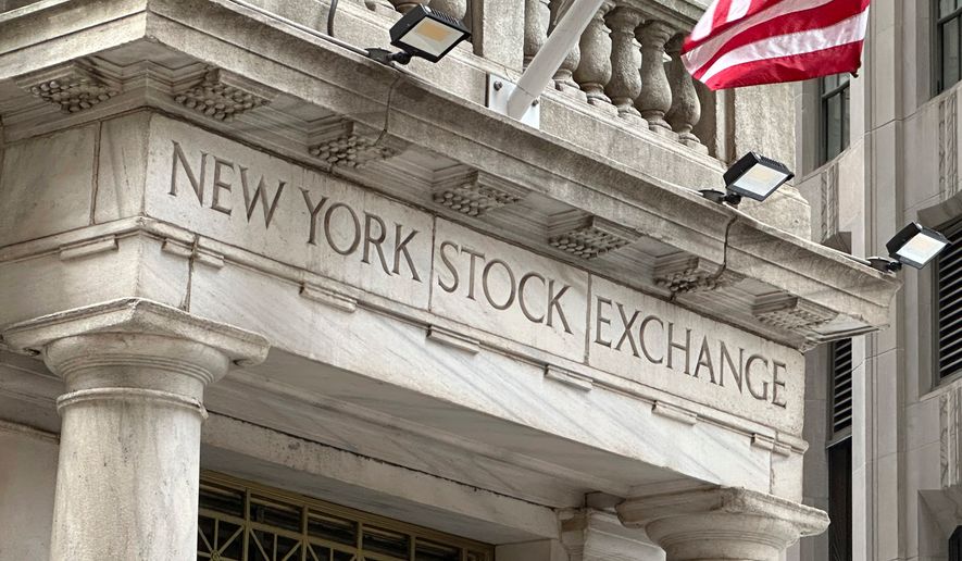 FILE - An entrance to the New York Stock Exchange is shown on June 26, 2024, in New York. (AP Photo/Peter Morgan, File)