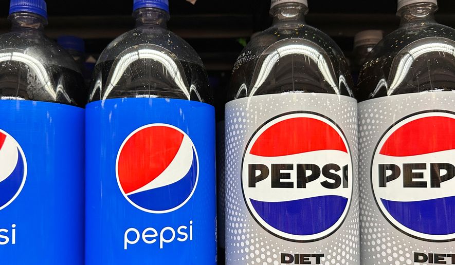 FILE - Plastic bottles of Pepsi are displayed at a grocery store in New York on Nov. 15, 2023. (AP Photo/Ted Shaffrey, File)