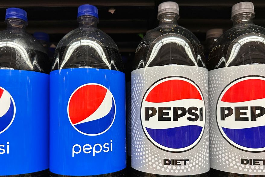 FILE - Plastic bottles of Pepsi are displayed at a grocery store in New York on Nov. 15, 2023. (AP Photo/Ted Shaffrey, File)