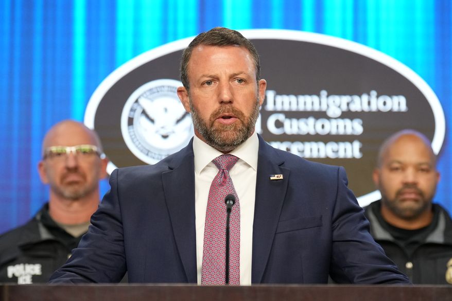 Secretary of Homeland Security Markwayne Mullin, with Immigration and Customs Enforcement (ICE) officials, speaks during a news conference at ICE Headquarters, Friday, Oct. 9, 2026, in Washington. (AP Photo/Jacquelyn Martin)