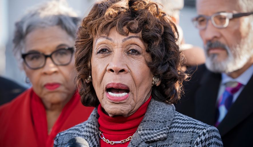 FILE - Rep. Maxine Waters, D-Calif., leads a group of House Democrats to the Supreme Court in support of Federal Reserve Board Governor Lisa Cook on Capitol Hill in Washington, Jan. 21, 2026. (AP Photo/J. Scott Applewhite, File)