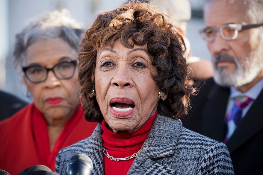 FILE - Rep. Maxine Waters, D-Calif., leads a group of House Democrats to the Supreme Court in support of Federal Reserve Board Governor Lisa Cook on Capitol Hill in Washington, Jan. 21, 2026. (AP Photo/J. Scott Applewhite, File)