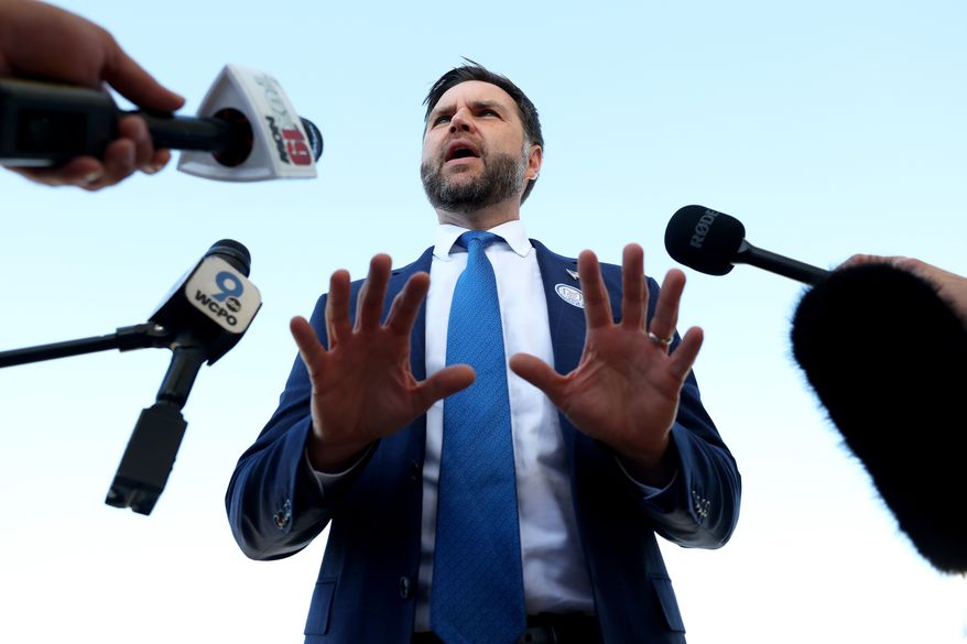 Vice President JD Vance speaks to members of the media at Cincinnati/Northern Kentucky International Airport, Friday, Oct. 9, 2026 in Hebron, Ky., as he departs for a rally in Lima, Ohio. (Samuel Corum/Pool Photo via AP)