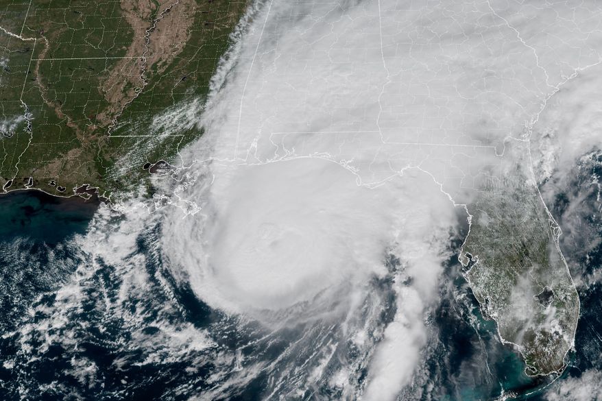 This GOES-19 GeoColor satellite image provided by the National Oceanic and Atmospheric Administration (NOAA) and taken at 1:06 p.m. EDT, Friday, Oct. 9 2026, shows Hurricane Isaias approaching the Gulf Coast of Alabama and Florida . (NOAA via AP)