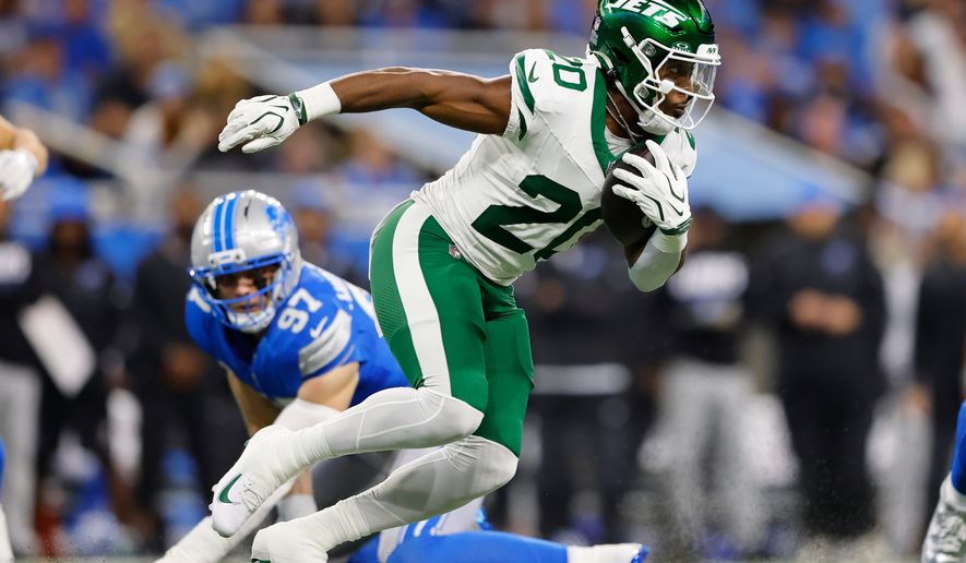 New York Jets' Breece Hall runs during the first half of an NFL football game against the Detroit Lions in Detroit, Sunday, Sept. 27, 2026. (AP Photo/Rey Del Rio)