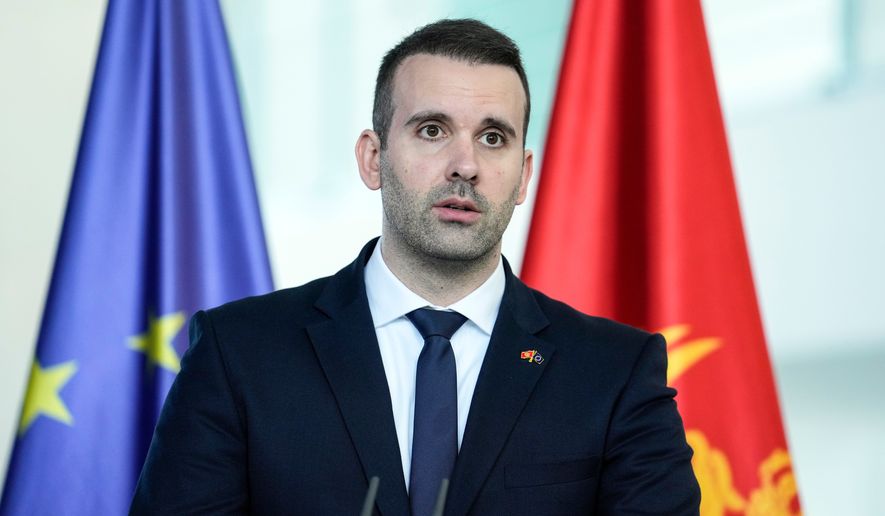 FILE - Montenegro's Prime Minister Milojko Spajic speaks during joint press conference with an Chancellor Olaf Scholz in the chancellory in Berlin, Monday, April 29, 2024. (AP Photo/Ebrahim Noroozi, file)
