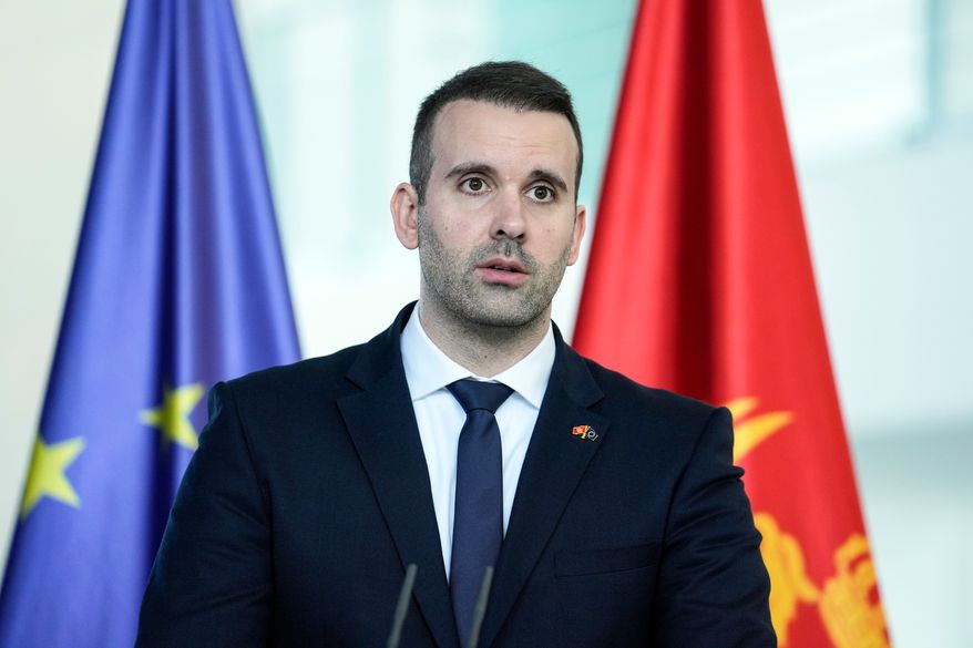 FILE - Montenegro's Prime Minister Milojko Spajic speaks during joint press conference with an Chancellor Olaf Scholz in the chancellory in Berlin, Monday, April 29, 2024. (AP Photo/Ebrahim Noroozi, file)