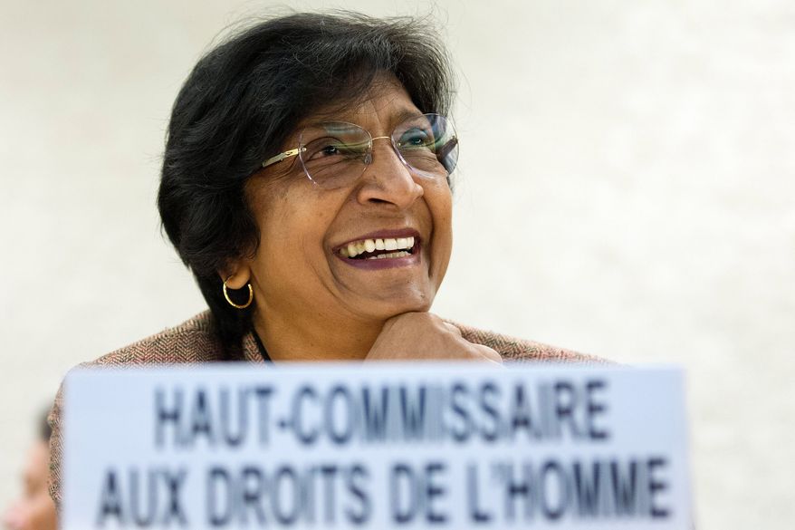 This file image shows U.N. human rights chief Navanethem Pillay before the opening of a session of the Human Rights Council at the European headquarters of the United Nations in Geneva, Switzerland, June 18, 2012. (Salvatore Di Nolfi/Keystone via AP, File)