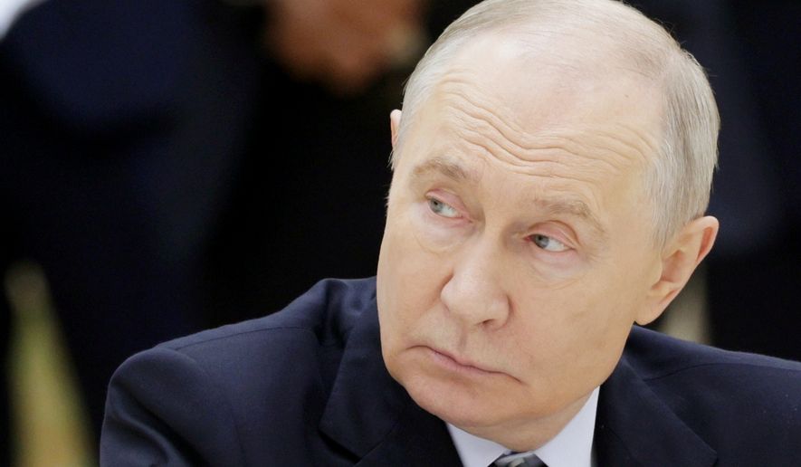 Russian President Vladimir Putin attends the extended format meeting at the Commonwealth of Independent States (CIS) summit in Turkmenbasy, Turkmenistan, Friday, Oct. 9, 2026. (Gavriil Grigorov, Sputnik, Kremlin Pool Photo via AP)