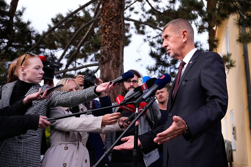 Czech Republic's Prime Minister Andrej Babis talks to media after casting his vote during senate and local elections in Pruhonice, Czech Republic, Friday, Oct. 9, 2026. (AP Photo/Petr David Josek)